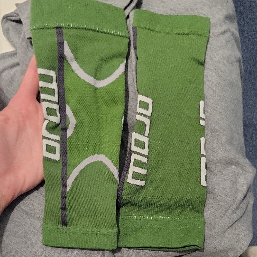 Green Compression with White and Black Accents